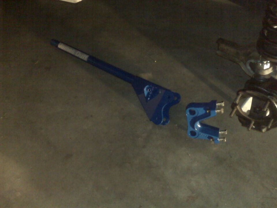 Blue painted Dana 60 axle with disc brake components, likely from a heavy-duty truck