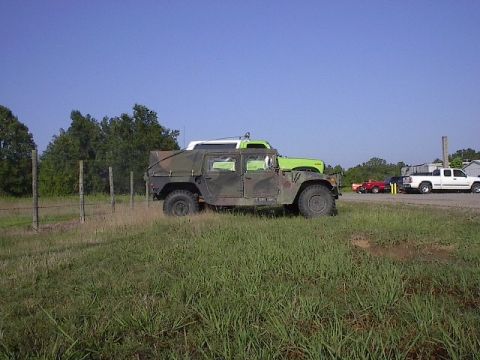 1986 Ford Bronco - Hulk tries to hide behind the hummer.