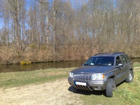 1991 Ford LTD Crown Victoria - Photograph of a Jeep Grand Cherokee outdoors, not a technical document.