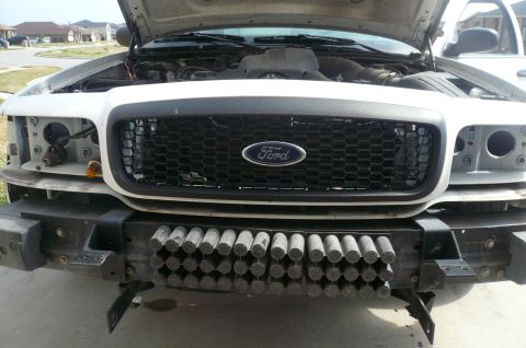 2004 Ford Crown Victoria - REMOVED THE BUMPER COVER TO REMOVE THE POLICE BRUSH GUARD BRACKETS AND VIC HEADER PANEL