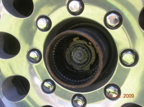 1985 Ford Bronco - Wheel hub assembly detail, showing lug nuts and the splined drive mechanism.