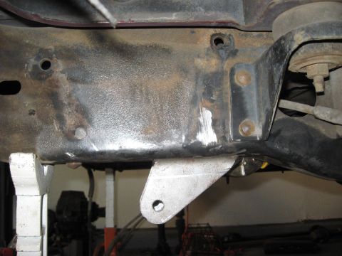 1991 Ford Bronco - This photo shows a modified vehicle frame, possibly for off-road use, with a custom bracket welded on.