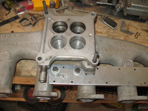 1981 Ford Bronco - The custom accelerator bracket bolted to the manifold. I used the bolt holes that normally bolted the intake to the stock 1bbl exhaust.