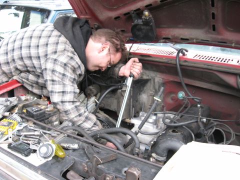 1981 Ford Bronco - Getting all the manifold bolts nice and tight. As with any new part, it's always a little nerve-racking.... 26ft lbs, one at a time.