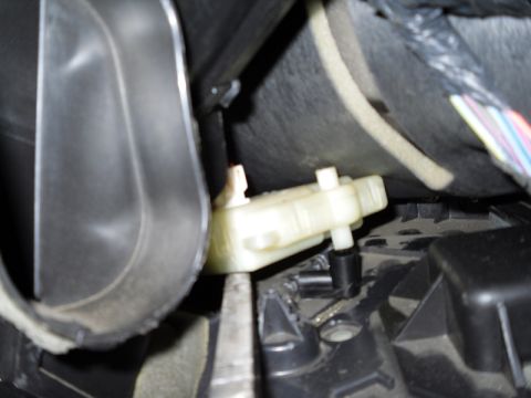 2004 Mercury Marquis - HVAC blend door actuator mechanism shown in detail.