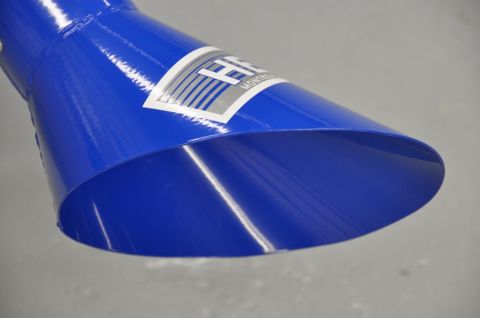 1996 Ford Bronco - A close-up shot focuses on a blue exhaust tip with a prominent HKS sticker.