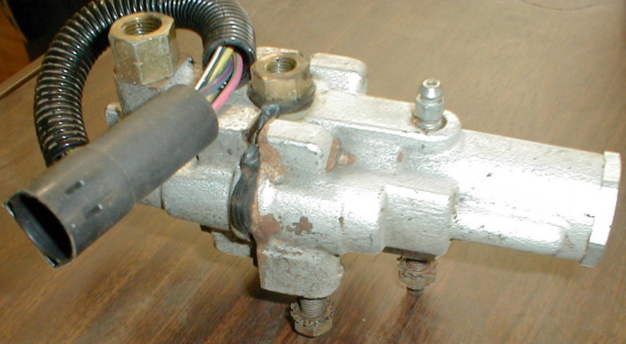 Cast aluminum hydraulic brake proportioning valve with wiring connector and lines