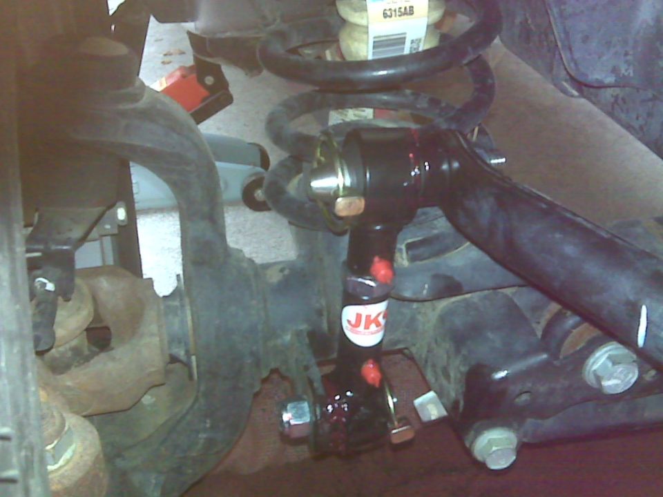 Jeep Wrangler JK suspension with black adjustable control arm