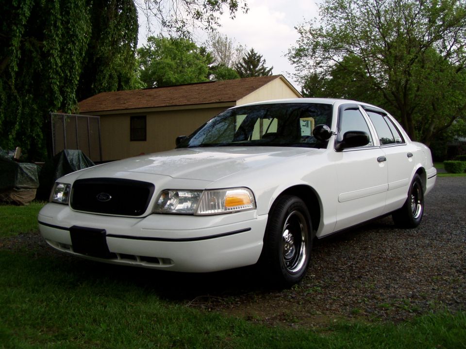 White 1999 Ford Crown Victoria, 3q front view