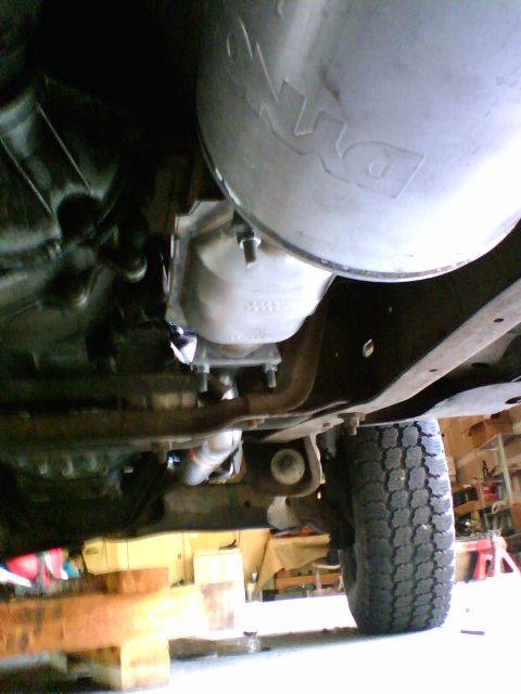 1981 Ford Bronco - A picture from underneath the Bronco of all the exhaust in place. It was so sturdy and strong I could lift my entire body weight off of the…