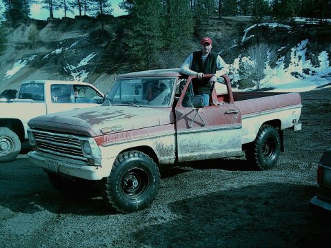 1968 Ford F-250 - Man poses with his 1968 Ford F-250 pickup truck in an outdoor setting.