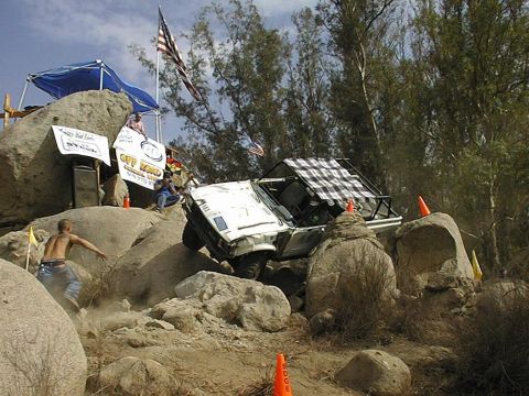 1997 Ford Ranger - An off-road vehicle navigates a challenging rocky terrain during an event.