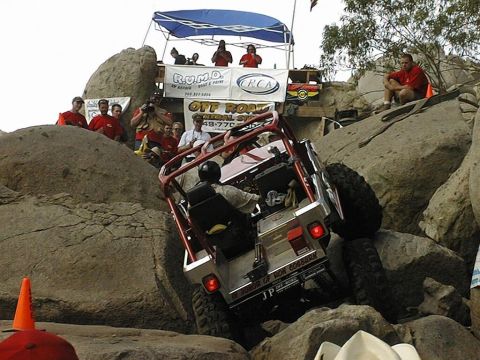 1997 Ford Ranger - An off-road buggy navigates a challenging rocky course during an event.