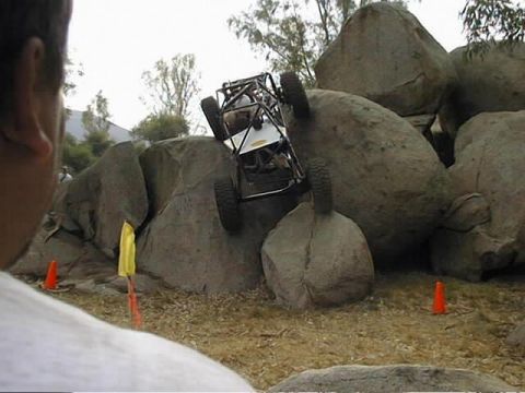 1997 Ford Ranger - A custom off-road buggy navigates a challenging rock obstacle course.