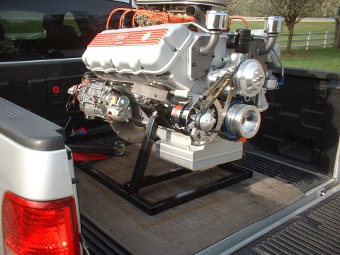 1970 Ford Mustang - A Ford GT 351 V8 engine is transported in the bed of a pickup truck, with "Supermotors.net" visible in the lower right corner.