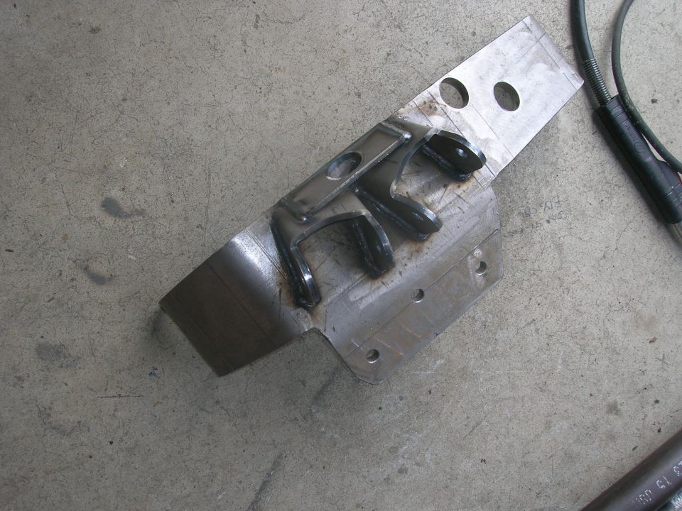 Rear suspension part on concrete floor