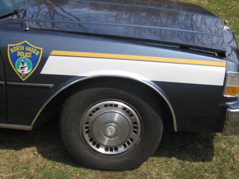 1991 Ford LTD Crown Victoria - Side view of a 1991 Ford Crown Victoria LTD police car with North Haven Police markings.