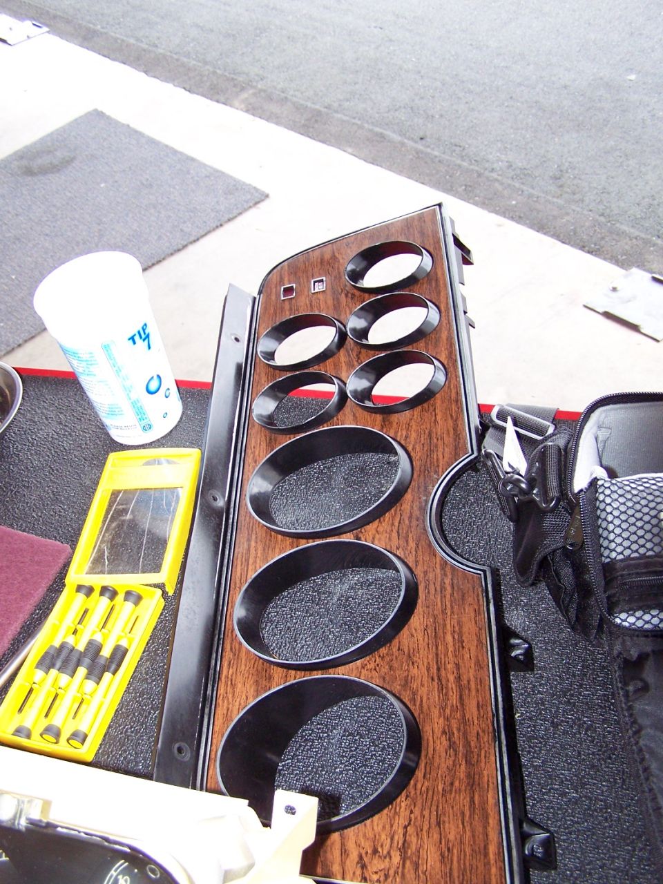 GT's and Squires got this wood grained instrument cluster surround