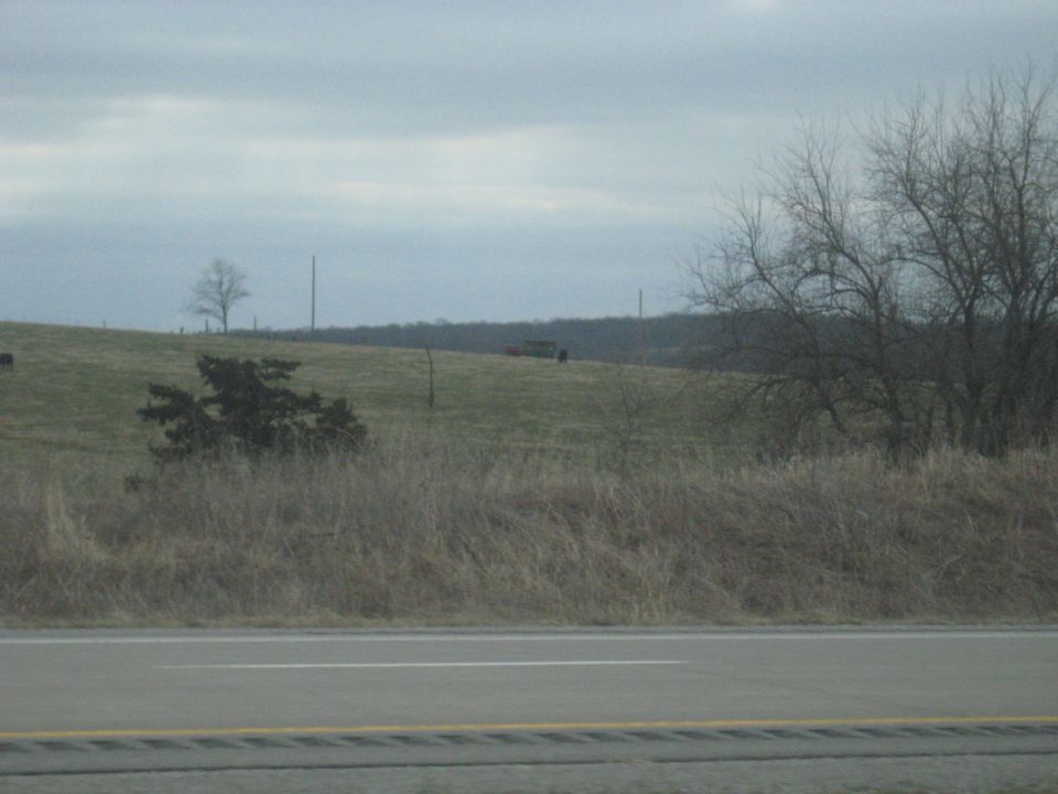 old truck parked on grassy hill