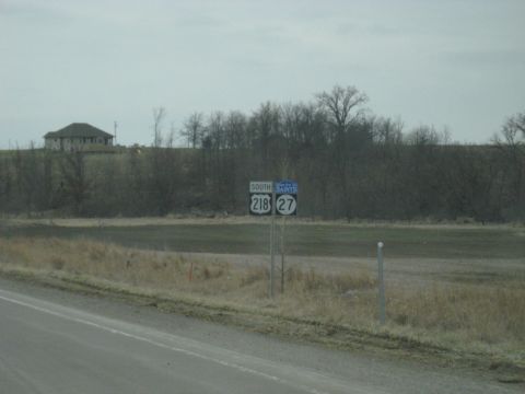 1978 Ford Bronco - A view of a rural landscape highway route markers and a distant house.