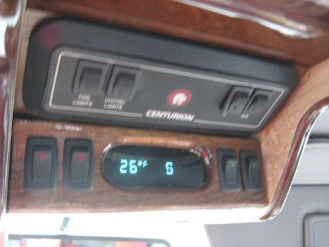 1978 Ford Bronco - The vehicle's interior features a digital display and multiple switches for various functions.