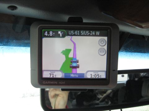 1978 Ford Bronco - A Garmin nuvi GPS unit mounted inside a vehicle shows navigation details, including speed and estimated arrival time.