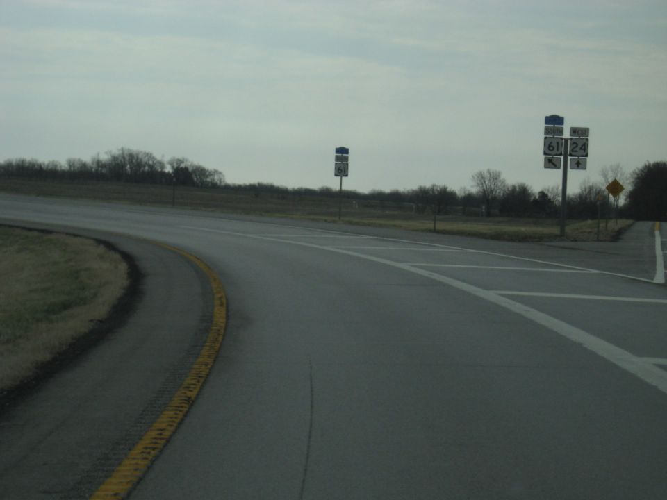 Highway intersection with signs for routes 61 and 24