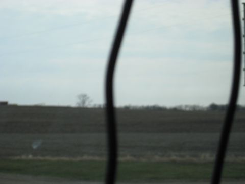1978 Ford Bronco - View of a rural landscape under a cloudy sky.