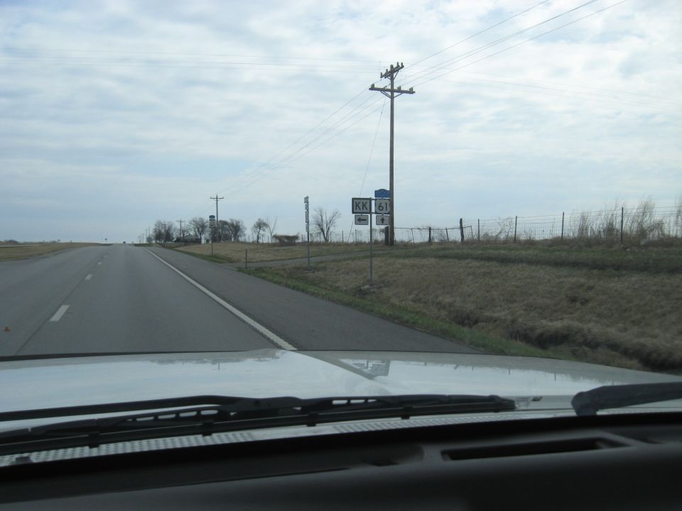 Dashboard view of road signs for KK 61
