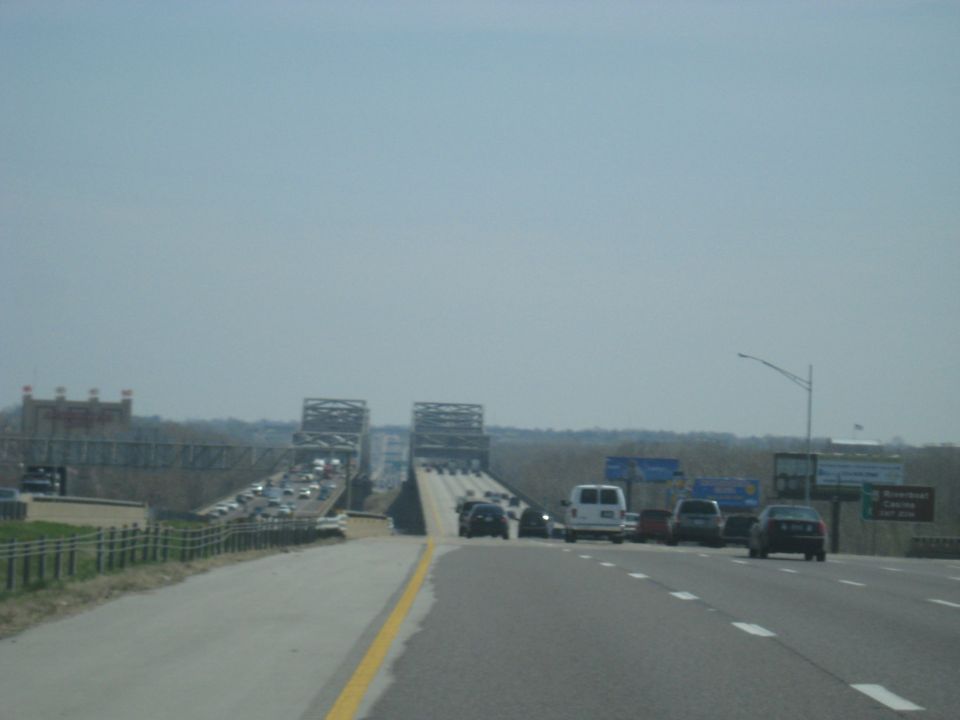 Traffic jam on a multi-lane bridge with cars and vans