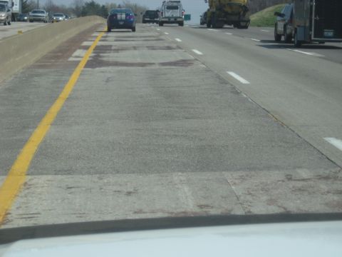 1978 Ford Bronco - Driving on the highway with various vehicles around.