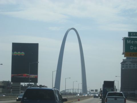 1978 Ford Bronco - Driving past the Gateway Arch with traffic on the highway.
