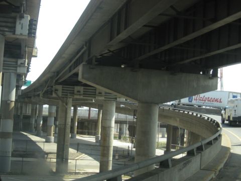 1978 Ford Bronco - Vehicles travel on a highway overpass, with a Walgreens truck visible among them.