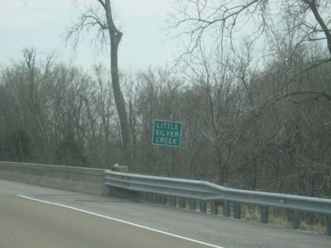 1978 Ford Bronco - A sign indicates the location of Little Silver Creek alongside a highway bridge.