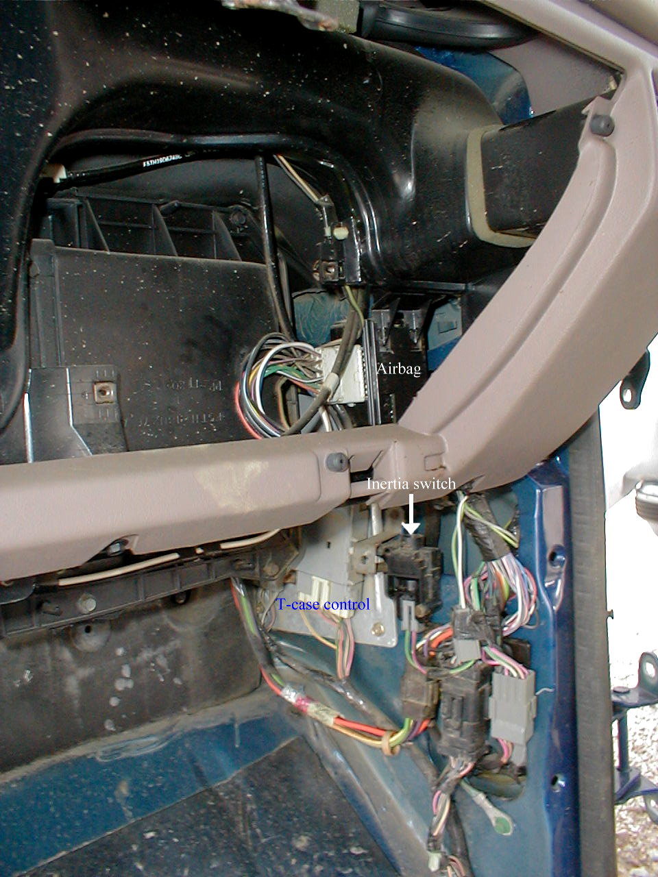 ERROR ! ! ! ! ! ! ! ! ! !

The module I MISlabelled as "Airbag" is actually the Wiper Control Module (WCM).  The Airbag Diagnostic Module (ADM) is light blue, wrapped in black foam, above the gas pedal.