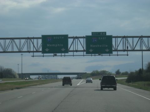 1978 Ford Bronco - Driving on the highway with overhead signs indicating directions to Memphis and Nashville.