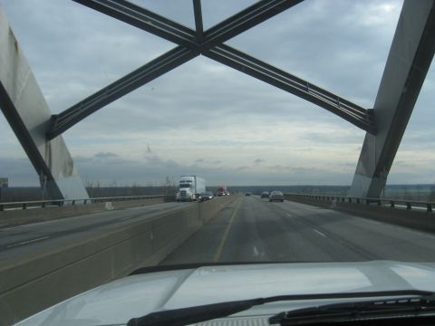 1978 Ford Bronco - View from a vehicle driving across a large bridge with multiple lanes of traffic.