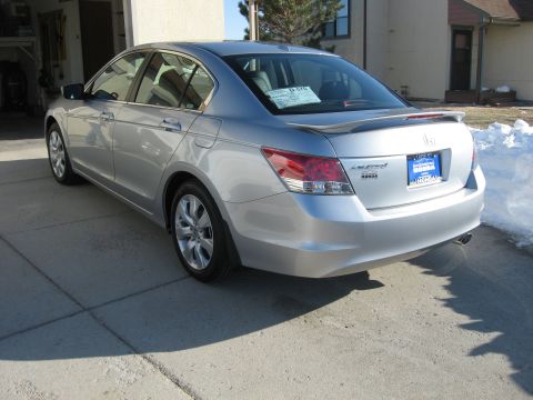 2009 Honda Accord - Silver 2009 Honda Accord sedan parked in a driveway with snow on the ground.