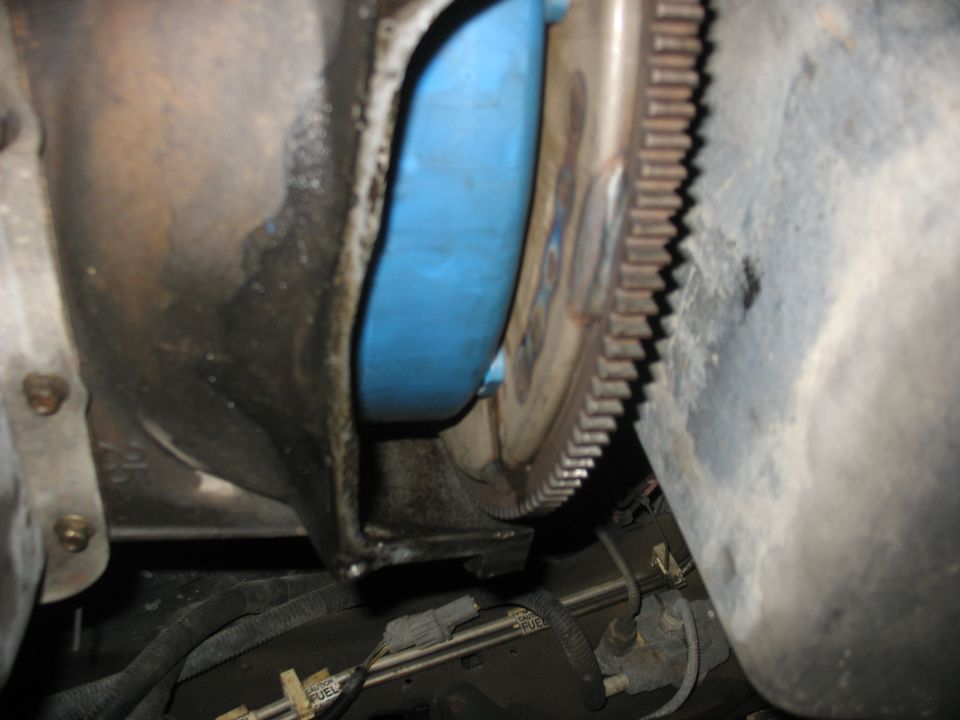 Transmission bell housing and flexplate with blue component