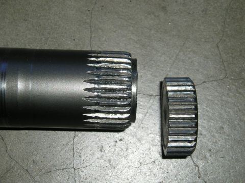 1986 Toyota Hilux - Close-up of a splined shaft and a separate coupling piece.