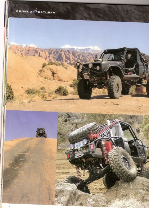 1996 Ford Bronco - Modified SUVs tackle challenging off-road terrain in a desert landscape.