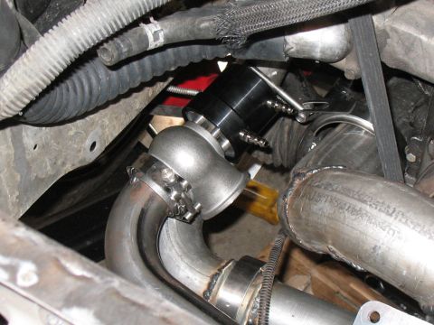 2001 Pontiac Trans Am - Custom turbocharger and blow-off valve installation with visible piping and engine components.