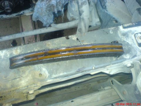 1992 Ford Crown Victoria - A worn timing chain guide, likely from an engine, is shown in this close-up view.