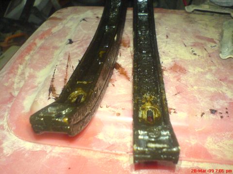 1992 Ford Crown Victoria - These timing chain guides appear to be worn and dirty, suggesting they may need replacement.