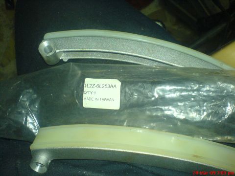 1992 Ford Crown Victoria - Timing chain guides with part number 1L2Z-6L253AA are shown.