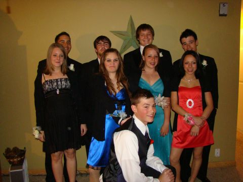 1989 Ford Bronco - A group of young people dressed up for a formal event, posing for a photo.