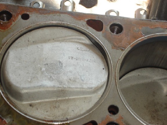 Ford piston in cylinder bore stamped with a part number