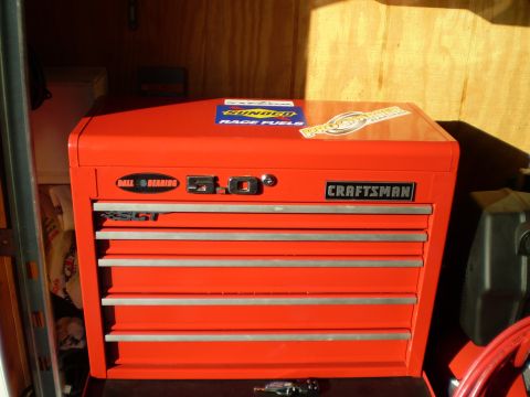 1981 Garelli Rally Sport - A red Craftsman toolbox sits open, displaying its drawers and various stickers on its lid.