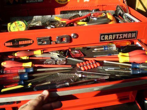 1981 Garelli Rally Sport - A red Craftsman toolbox drawer is open, revealing a variety of screwdrivers and other tools neatly organized within.