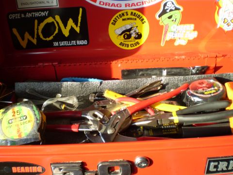 1981 Garelli Rally Sport - A collection of tools and stickers are visible inside an open red toolbox.